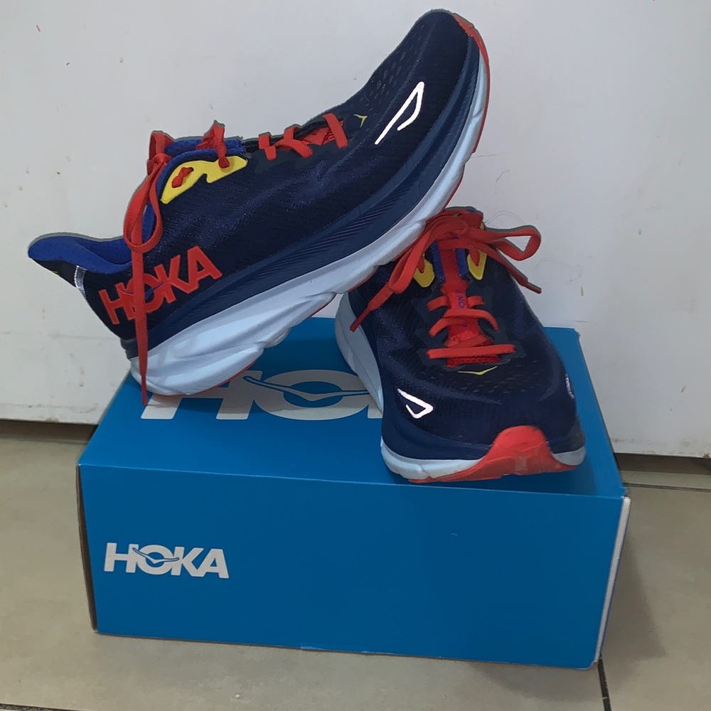 Hoka Navy Running Shoes with Red and Yellow Accents